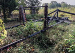 The jerker lines extending from the rig pass through a field wheel to change the direction of the jerker lines.