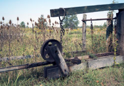 The shiv wheel transfers the power from the jerker line to the walking beam of the pumpjack to operate the pump far below the ground.