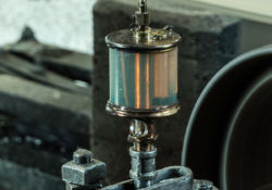 Oil is poured into the lubricating cup of the rig to keep the powerhouse running smoothly.